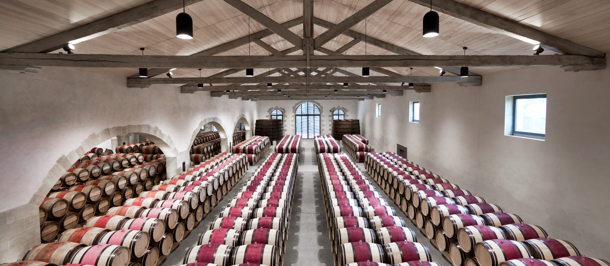 Large hall filled with wine barrels